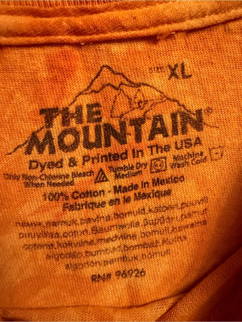 The Mountain Orange Tie-Dye Dog Graphic Tee with Multicolor Pit Bull Art